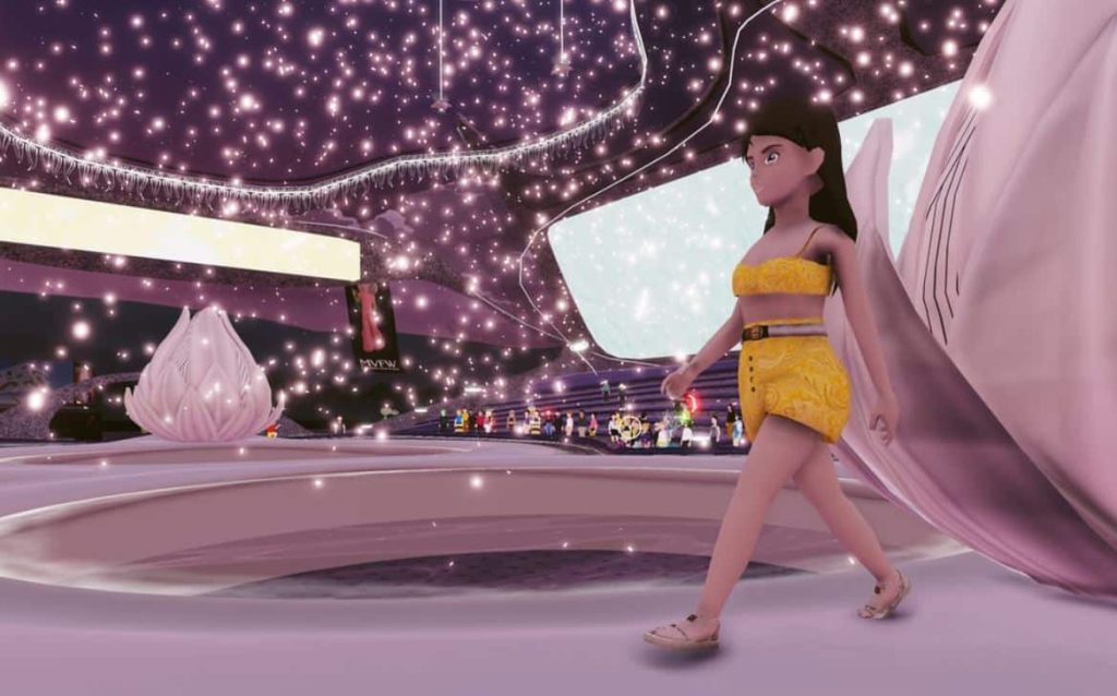 Decentraland’s Metaverse Fashion Week is Back for 2023! image of a digital model walking down the runway during the Metaverse Fashion Week in Decentraland